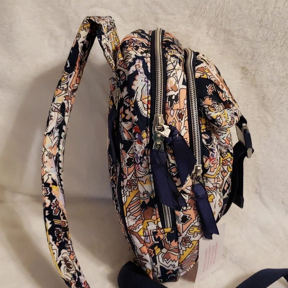 Vera Bradley Women's‎ Performance Twill Utility sling backpack.